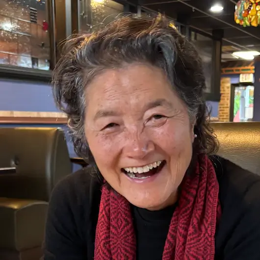 Portrait of Unyong smiling outdoors